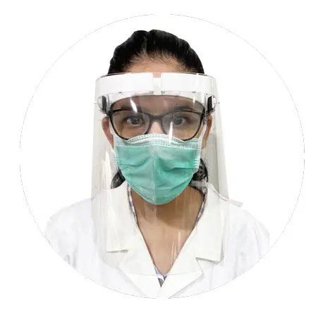 Healthcare worker wearing Dhumal personal protective face shield with mask — front view